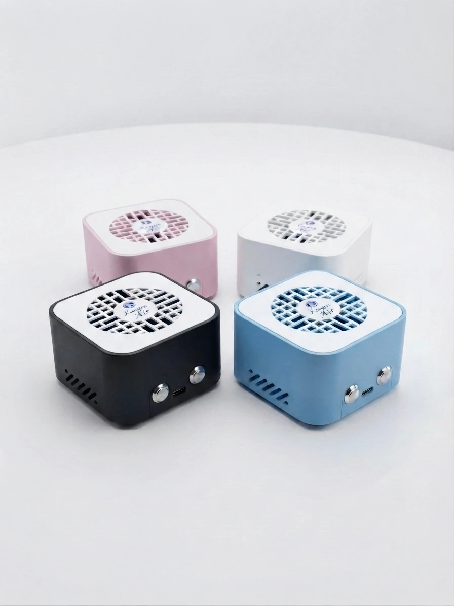 Four Kangen AIR units in black blue pink and white colors